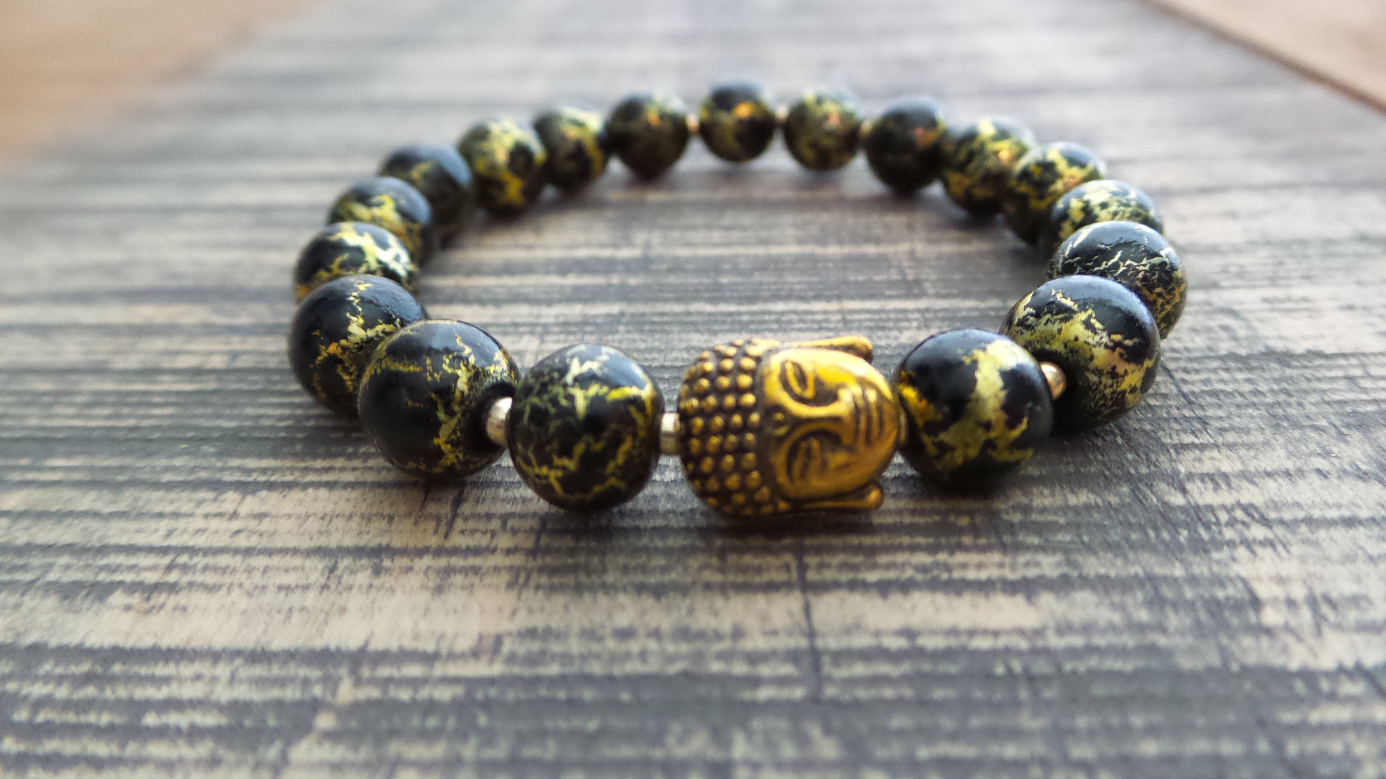 Bracelet- Black and Gold Vein Glass with Gold Buddha