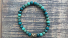 Bracelet- Green Wood with Antique Brass Buddha