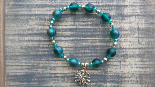 Bracelet- Iridescent Green and Gold with Gold Sand Dollar